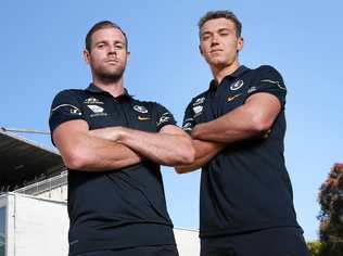 CRUEL BLOW: New Carlton co-captain Sam Docherty (left) will miss another season of AFL football after rupturing his ACL at training on Monday. Picture: Michael Dodge