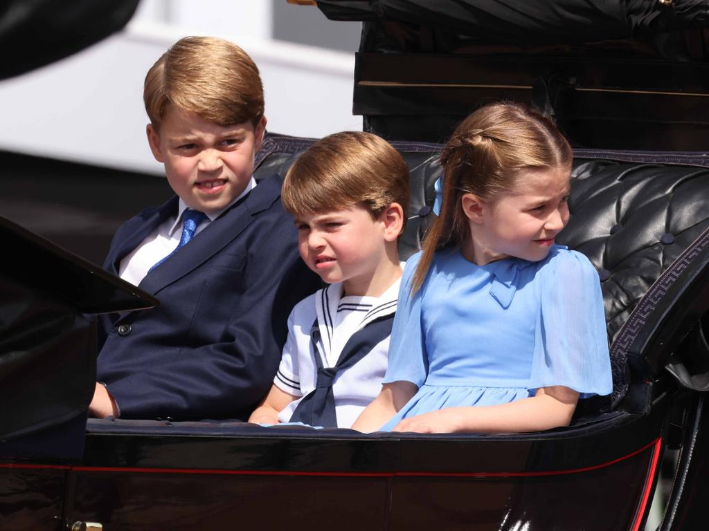 The Cambridge kids looked nonplussed by all the fuss. Picture: Getty Images