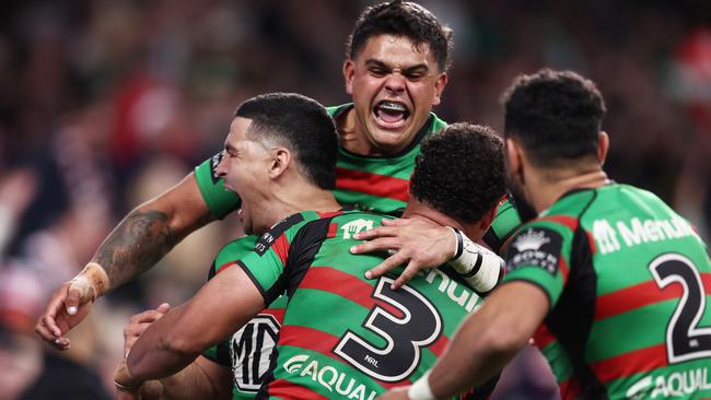 Cody Walker (left) and Latrell Mitchell (top) both had big games. Picture: Matt King/Getty Images