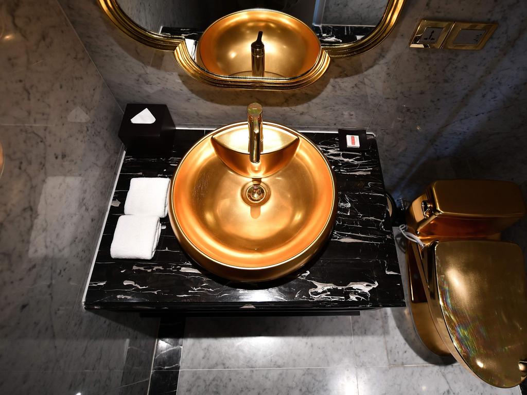 The gold-plated sink provides extra incentive to wash your hands. Picture: Manan Vatsyayana/AFP