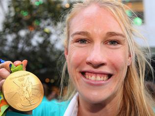 MELBOURNE, AUSTRALIA - AUGUST 31: Gold medallist Kim Brennan poses with her medal during the Australian Olympic Team Melbourne Welcome Home Celebration at Bourke Street on August 31, 2016 in Melbourne, Australia. (Photo by Michael Dodge/Getty Images)