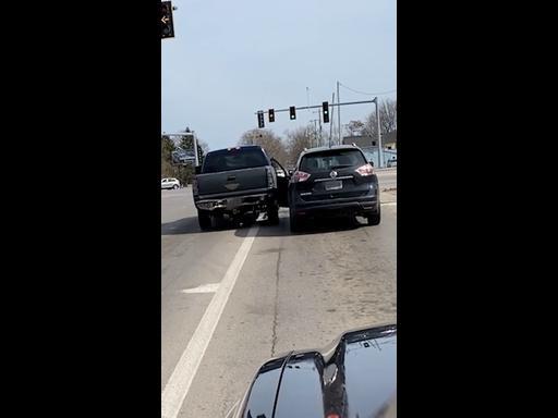 Driver captures alleged road-rage incident as man rams car door