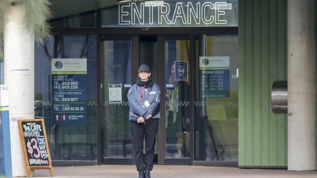 A security guard outside the safe injecting room at North Richmond. Picture: Wayne Taylor