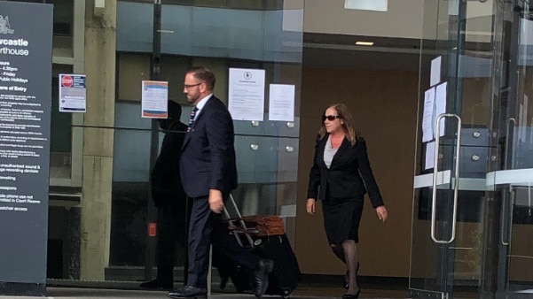 Katherine Murphy leaving Newcastle Local Court with lawyer Drew Hamilton. Picture Amy Ziniak