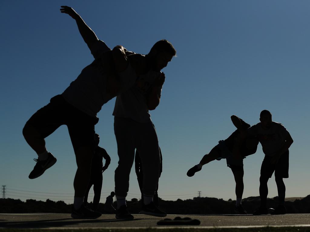 UFC fighter Rob Whittaker training at Wanda sand dunes, Cronulla. Picture: Brett Costello