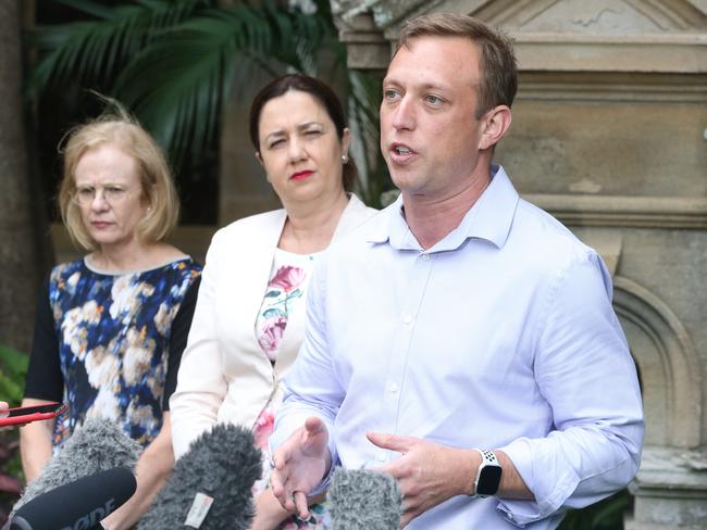 Queensland Health Minister Steven Miles, right, and Premier Annastacia Palaszczuk, centre. Picture: AAP