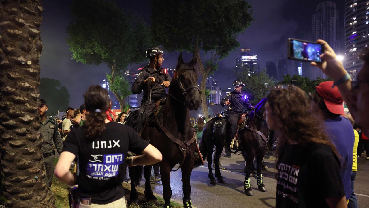 Israeli mounted police stand guard during a protest in Tel Aviv by relatives and supporters of hostages taken captive by Palestinian militants in Gaza. Picture: AFP