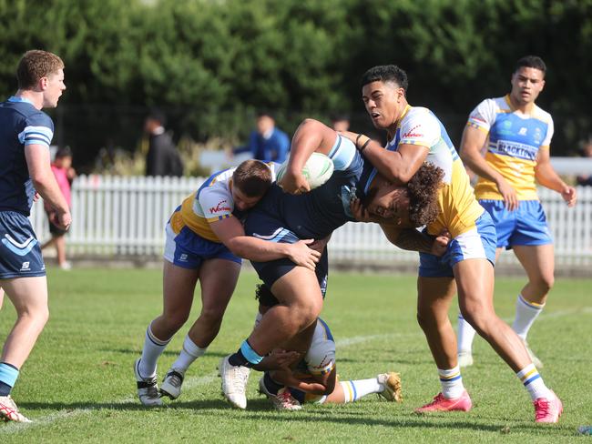 DAILY TELEGRAPH. MAY 7, 2025. Pictured is The Peter Mulholland Cup at Ringrose Park, Wentworthville today. Patrician Brothers Blacktown (blue and yellow) v Matraville SHS. Picture: Tim Hunter.