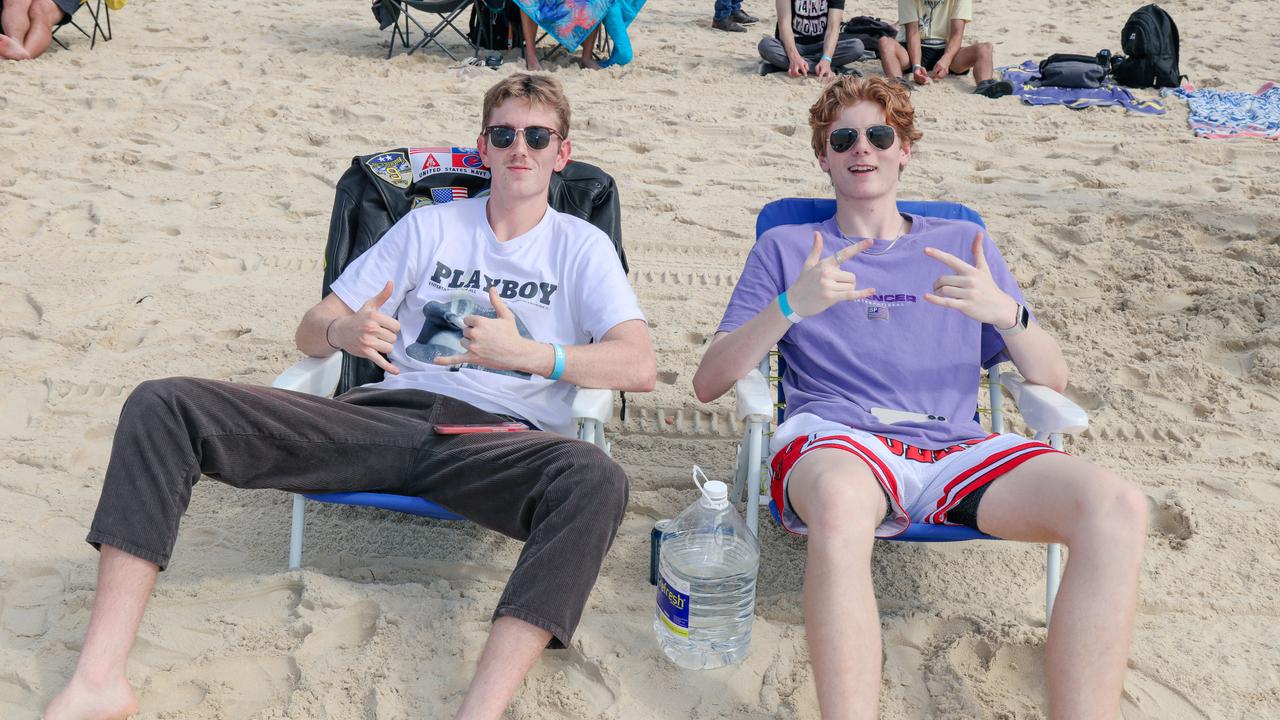 Nathan Stary and Luke Green enjoying the inaugural Pacific Air Show over Surfers Paradise. Picture: Glenn Campbell