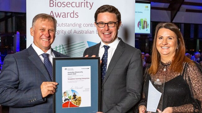 Shane Templeton (left) accepting the Farm Biosecurity Producer of the Year award 2020 on behalf of Templeton Farming Enterprises