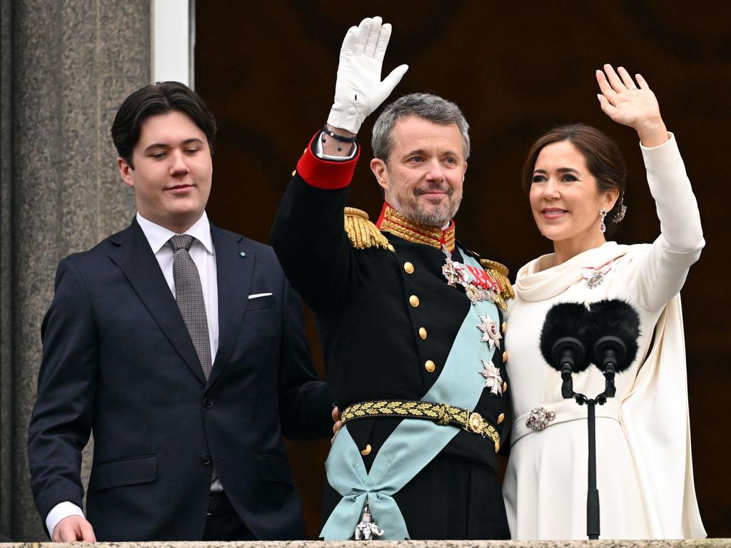 With their son, Crown Prince Christian, during the proclamation in January. Picture: Jonathan Nackstrand/AFP