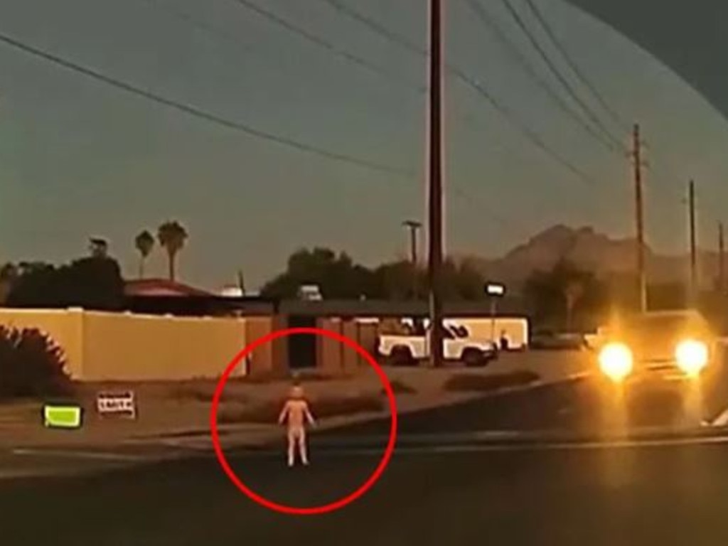 A toddler wandered onto a busy road in Arizona and was narrowly missed by passing cars. Picture: Arizona Family