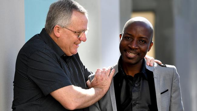 Mental health professional Stephen Odorcic with Northern suburbs resident Modeste HATUNGIMANA, who won a pride of australia award in the "fair go" category. He has established a mental health program for disadvantaged people in Africa, he will be travelling to Burundi with Stephen. Pic: Tricia Watkinson