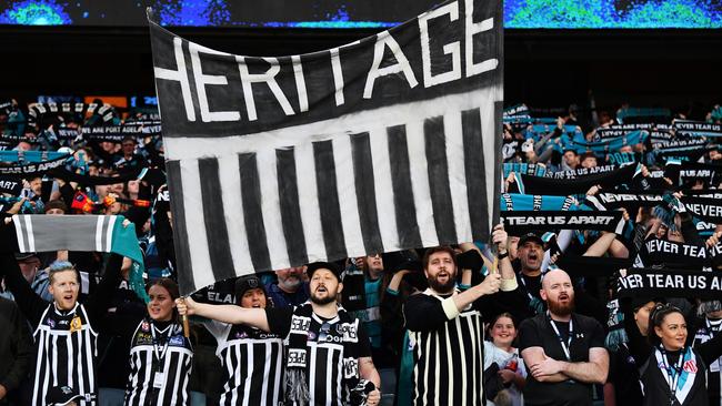 Port Adelaide fans hold up their heritage banner during the April 1 Showdown at Adelaide Oval between Port Adelaide and Adelaide. (Photo by Mark Brake/Getty Images)