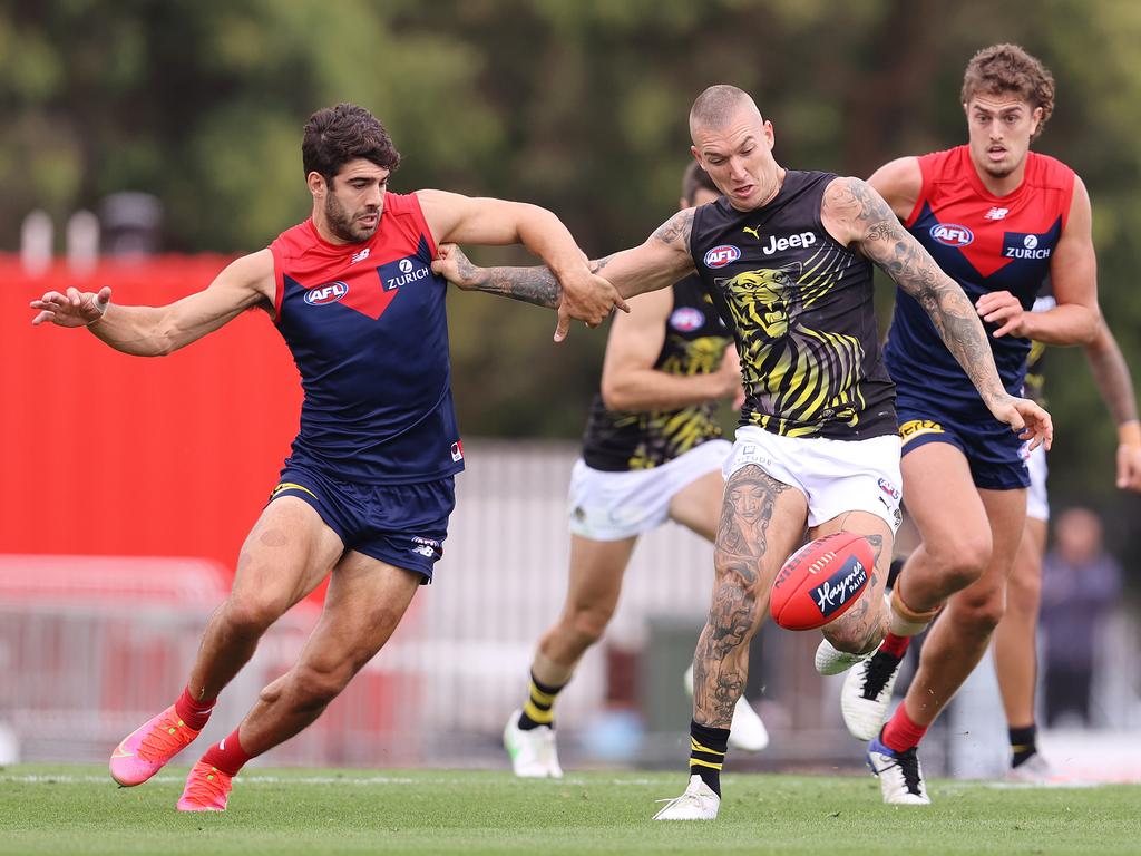 Richmond coach Damien Hardwick isn’t expecting Dustin Martin and Christian Petracca to go head to head on Saturday night. Picture: Michael Klein