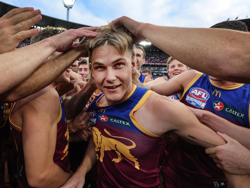 <p>AFL Grand Final between the Brisbane Lions and Sydney Swans at the MCG. Brisbane Lions player Will Ashcroft is congratulated by teammates after being awarded the Norm Smith Medal. Picture: David Caird</p>