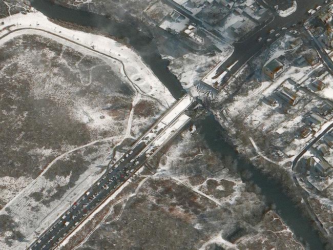 This Maxar satellite image taken and released shows a damaged bridge over the Irpin River in Irpin, Ukraine, west of Kyiv. Picture: AFP