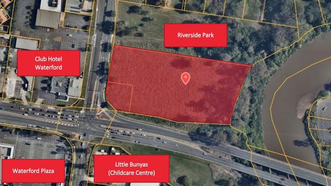 The busy intersection from the air with the block of land in red and the Riverside Park next door. The Club Hotel Waterford, where a median strip forces cars to do U-turns.