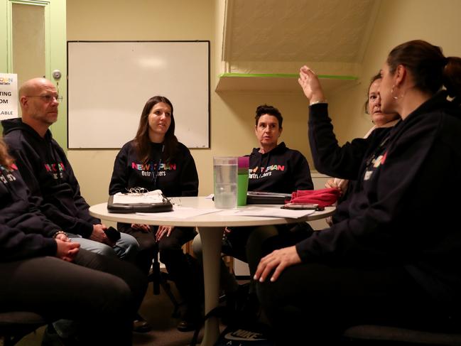 Volunteers for the Newtopian Community Homeless Outreach program are briefed by social worker Elaine Macnish (centre left) and NNC housing co-ordinator Karen Hunter (centre right) before they head out to do outreach. Picture: Jonathan Ng