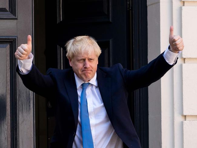 New Conservative Party leader and incoming prime minister Boris Johnson arrives at the Conservative party headquarters in central London on July 23, 2019. - Boris Johnson won the race to become Britain's next prime minister on Tuesday, heading straight into a confrontation over Brexit with Brussels and parliament, as well as a tense diplomatic standoff with Iran. (Photo by LEON NEAL / AFP)