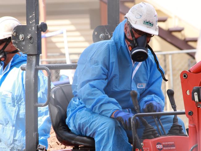 Asbestos removalists are dug up the oval and playgrounds of Warwick Central State School in a bid to give parents, students and staff peace of mind after asbestos was found in the grounds in August 2018.