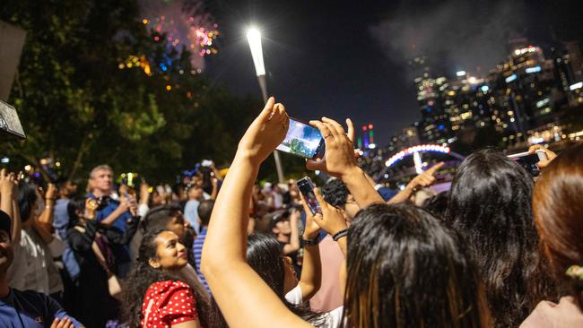 Crowds enjoying Melbourne’s 2022 New Year’s Eve fireworks.