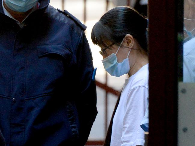 MELBOURNE, AUSTRALIA - NewsWire Photos MAY 12, 2021: Soo Phing Chew is escorted from the Supreme Court in Melbourne after her bail application hearing. She is allegedly part of a Chinese-Malaysian ice trafficking syndicate running in Tasmania and Victoria. Picture: NCA NewsWire / Andrew Henshaw