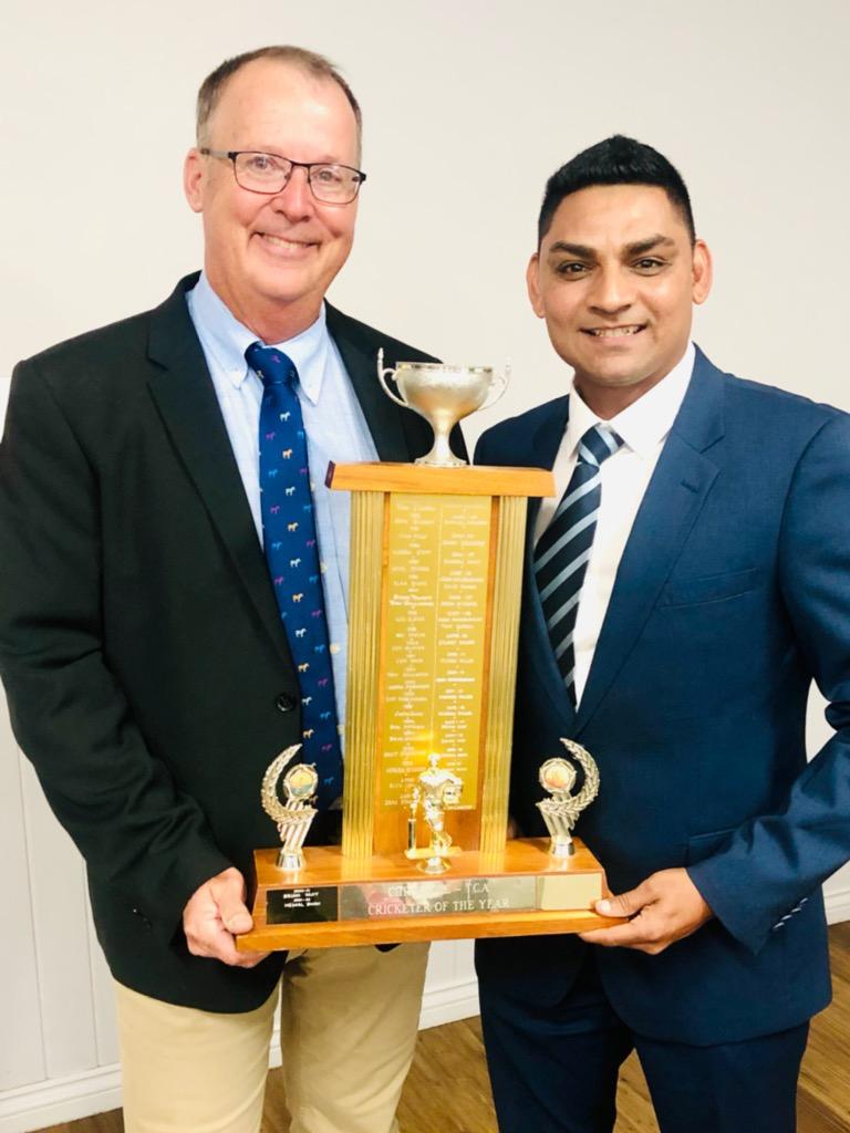 Hemal Shah (right) was named Toowoomba Cricket Player of the Year for the 2021/22 season. Pictured with TCI president Angus Rathie. Photo: Contributed