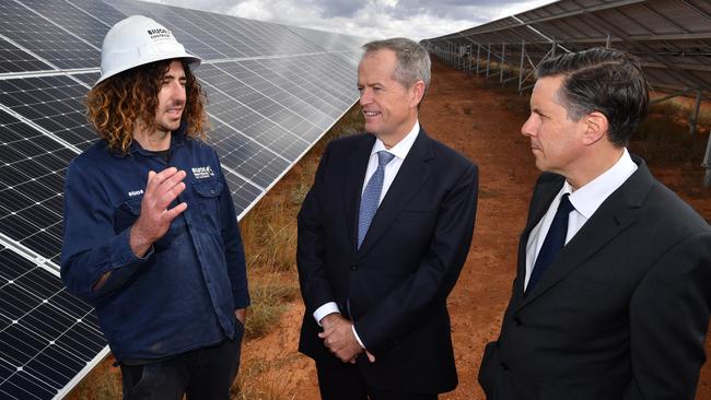 Wilson Burns, Bill Shorten and Mark Butler at the Southern Sustainable Electric solar farm in Whyalla. Picture: AAP / Darren England