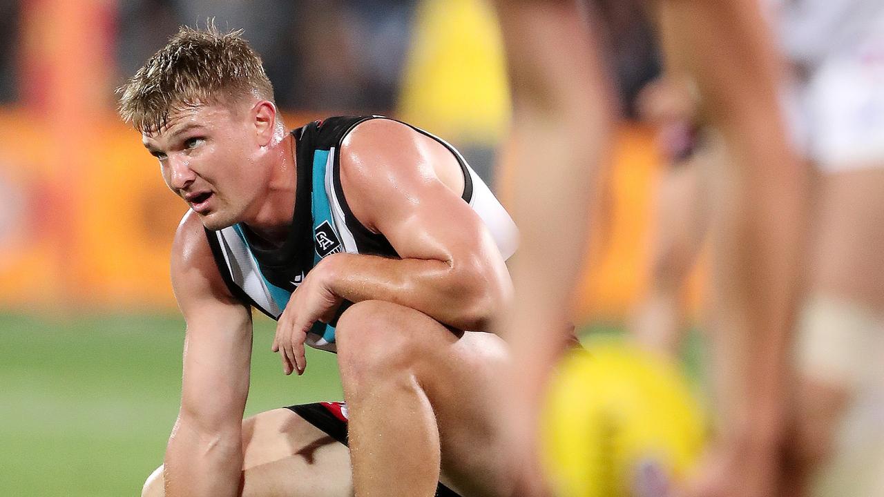 A dejected Ollie Wines on Saturday night. Picture: Sarah Reed/AFL Photos