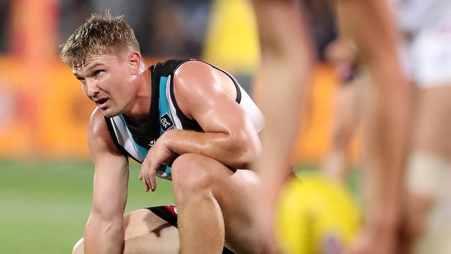 A dejected Ollie Wines on Saturday night. Picture: Sarah Reed/AFL Photos