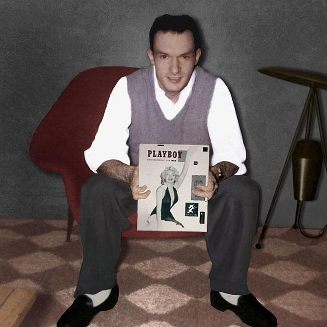 Playboy Magazine founder Hugh Hefner holding the first issue of Playboy featuring actress Marilyn Monroe on the cover. December 1953. Picture: Playboy