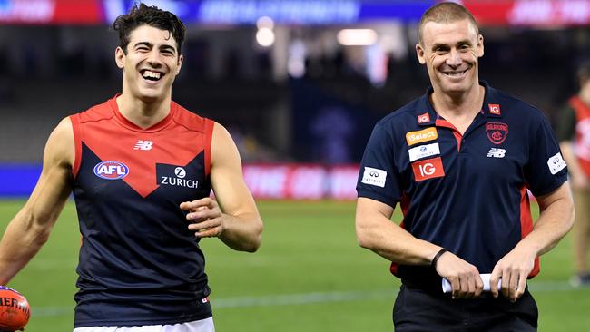 Melbourne players will decide what Simon Goodwin wears when he does down the slide. Picture: AAP Images