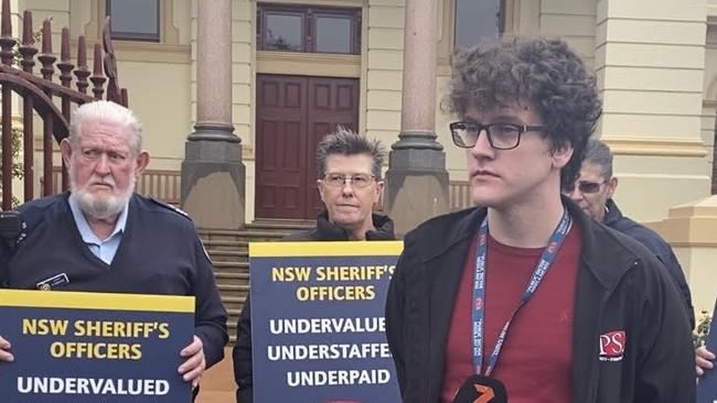 Public Service Association member Lachlan Good speaks to media in front of Dubbo courthouse. Picture: Tijana Birdjan