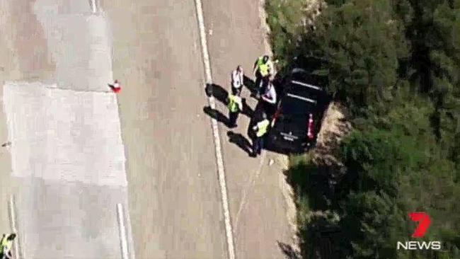 The M1 crash scene after the assault. Picture: Channel 7 News