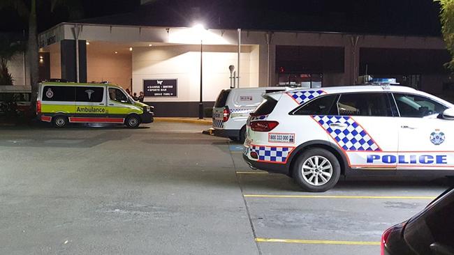 Police and an ambulance outside the Windaroo Tavern on Saturday night after a fight broke out in the carpark.