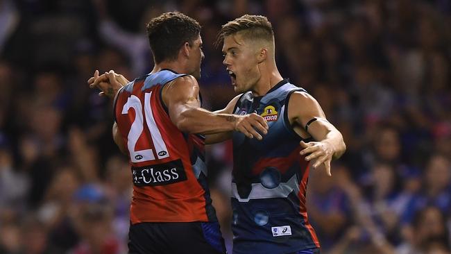 Josh Schache celebrates a goal with Tom Liberatore. Picture: AAP