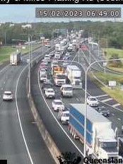 Morning commuters battled delays over an hour on the Gateway Motorway after a two vehicle crash in which one vehicle rolled on Wednesday morning. Photo: TMR