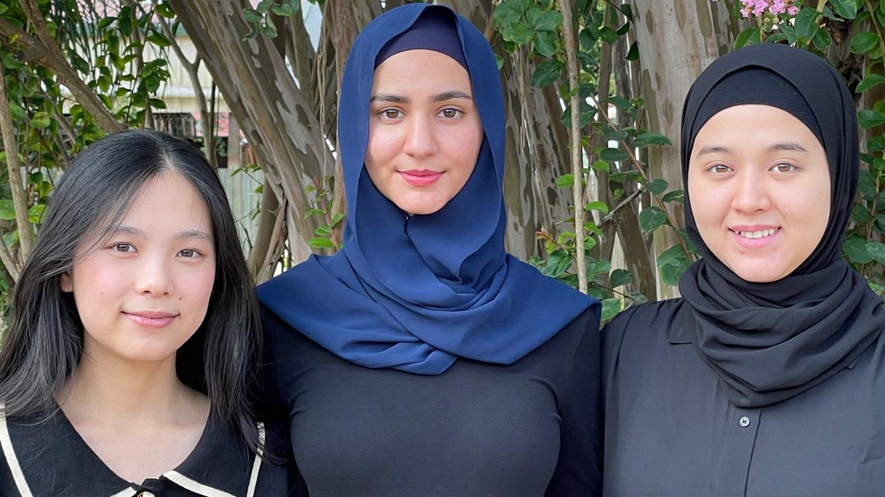 LEADERSHIP: Pure Land Youth Peace Group TYPG executive (from left) vice president Connie Qu, president Fatima Aria and secretary Fatemeh Hassani are inviting Toowoomba’s youth to come together. Picture: Peter Hardwick