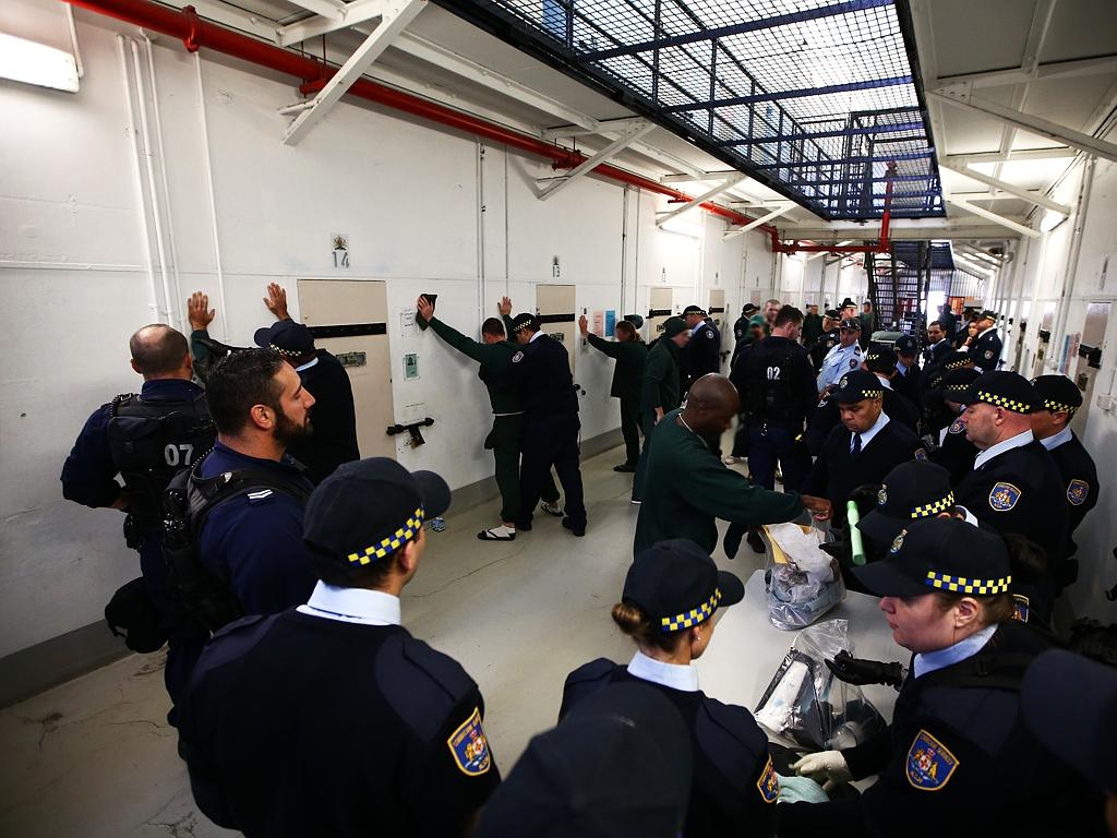 The trainees learn how to search prisoners and what to look for. Picture: Tim Hunter