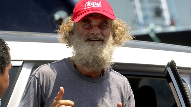 Australian sailor Tim Shaddock gives a thumbs up after arriving at the port of Manzanillo, Colima State, on July 18, 2023. (Photo by ULISES RUIZ / AFP)