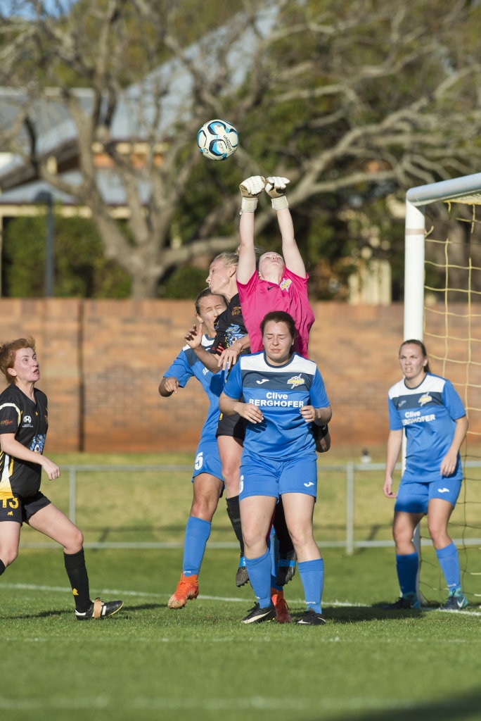 South West Queensland Thunder keeper Elizabeth Hollitt clears a shot from Mudgeeraba Soccer Club in NPL Queensland women round 24 football at Clive Berghofer Stadium, Saturday, August 11, 2018. Picture: Kevin Farmer