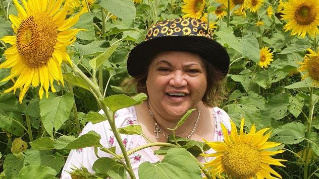 Miriam Rullis with her favourite flowers.