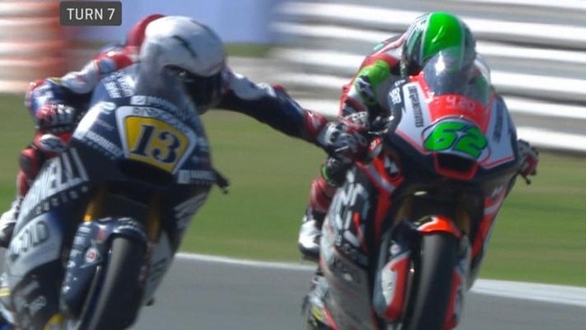 Moto2: Romano Fenati grabs the brake lever of rival Stefano Manzi mid-race.