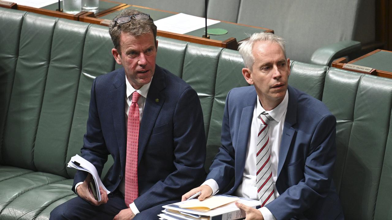 Shadow Immigration Minister Dan Tehan and Immigration Minister Andrew Giles, sitting next to each other during a vote, have had a series of heated exchanges in parliament over detainees released this year. Picture: NewsWire / Martin Ollman