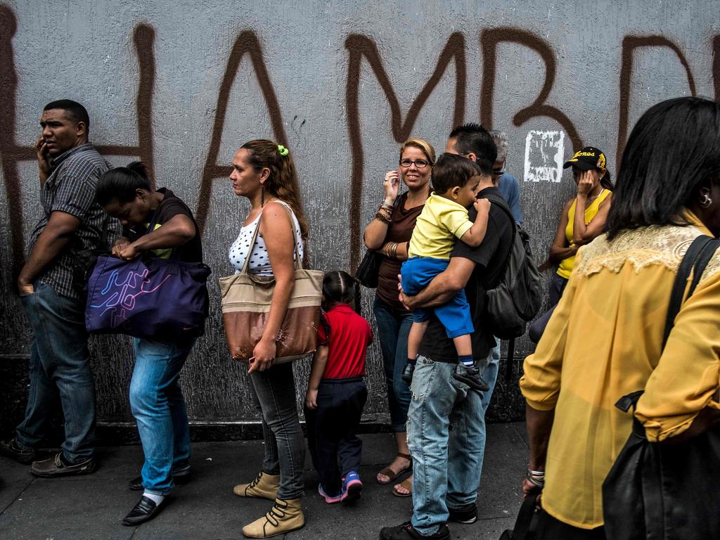 A wall with the word “hunger” written in graffiti in Caracas. Picture AFP