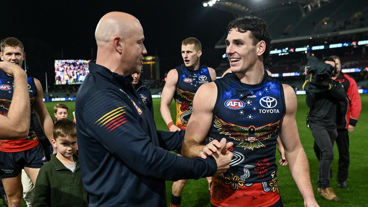 ADELAIDE, AUSTRALIA – JULY 13: Matthew Nicks, Senior Coach of the Crows and Hugh Bond of the Crows celebrates the win after the round 18 AFL match between Adelaide Crows and St Kilda Saints at Adelaide Oval, on July 13, 2024, in Adelaide, Australia. (Photo by Mark Brake/Getty Images)