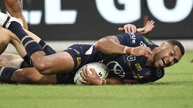 TOWNSVILLE, AUSTRALIA - APRIL 24: Justin O'Neil of the Cowboys scores a try during the round seven NRL match between the North Queensland Cowboys and the Canberra Raiders at QCB Stadium, on April 24, 2021, in Townsville, Australia. (Photo by Ian Hitchcock/Getty Images)