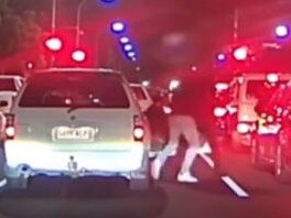 An altercation on a busy city centre road descended into physical blows, with the incident captured on a dashcam of another car. , , Footage obtained by 7NEWS shows a white car swerving across lanes and cutting off a minivan on Currie Street as it moves into the left lane. Picture:7NEWS