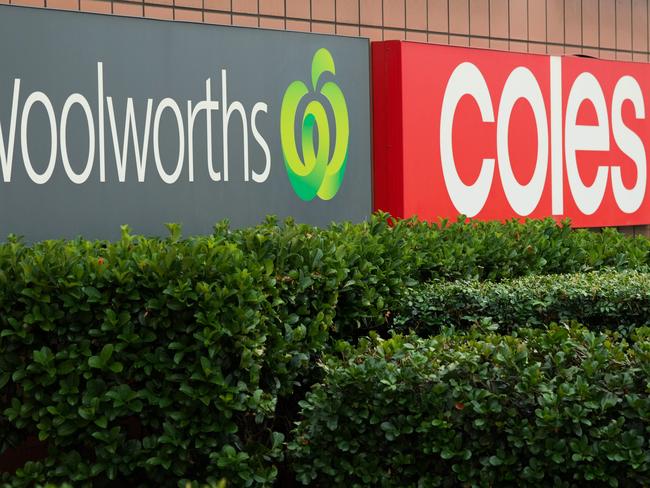 MELBOURNE, AUSTRALIA - MARCH 13: Woolworths and Coles supermarket signage on March 13, 2024 in Melbourne, Australia. Australia's two major supermarket chains, Coles and Woolworths, have come under scrutiny for their role in the cost of living crisis in the country, with both companies significantly increasing their profits during the pandemic while consumers faced rising living costs, local media reports said. Former cabinet minister Craig Emerson is leading a government inquiry into supermarket pricing practices, while former ACCC chair Allan Fels is conducting a separate investigation in collaboration with the Australian Council of Trade, ABC News said. (Photo by Asanka Ratnayake/Getty Images)